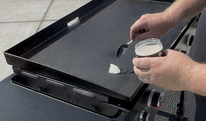 Side-by-side before and after results using GriddleMATe griddle seasoning oil – restores and protects griddle surface